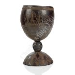 A SCRIMSHAW-DECORATED COCONUT SAILOR'S SWEETHEART GOBLET, CIRCA 1840