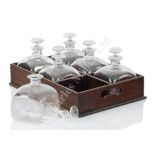 AN EARLY 19TH CENTURY SET OF SIX DECANTERS