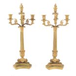 Pair Charles X gilt-bronze four-light candelabra