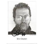 Eric Clapton signed small b/w photo. Good Condition. All signed items come with our certificate of