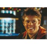 KRIS MARSHALL Actor signed Love Actually 8x12 Photo. Good Condition. All signed items come with