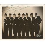 Eight men of Manhattan signed 10x8 sepia photo. Dedicated. Good Condition. All signed items come