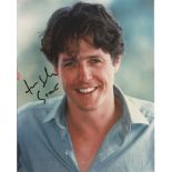 Hugh Grant signed 10x8 colour photo. Good Condition. All signed items come with our certificate of