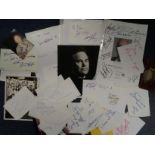 Assorted signed collection. Includes signed index cards, signature pieces, signed memorial