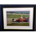 Nikki Lauda signed 12 x 8 colour action photo of the Formula One motor racing driver in his car.
