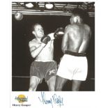 Henry Cooper signed 10 x 8 b/w boxing photo fighting Muhammad Ali. Autographed editions photo,