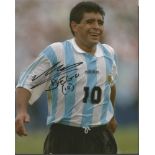 Diego Maradona signed 10x8 colour photo in Argentina strip. Good condition. All signed items come