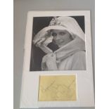 Mia Farrow signature piece mounted below b/w photo. American actress, activist, and former fashion