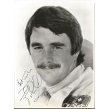 Nigel Mansell signed 10x8 b/w photo. Slight yellowing to bottom of photo. British former racing