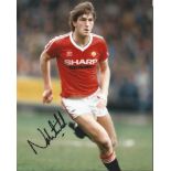 Norman Whiteside signed 10x8 colour photo. former Northern Ireland international footballer who