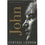 John hard back book by Cynthia Lennon signed on title page by Cynthia Lennon and Julian Lennon.306