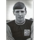 Martin Peters Signed West Ham United 8x12 Photo. Good condition. All signed items come with our
