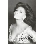 Sophia Loren signed 6x4 b/w photo. Italian film actress and singer. Encouraged to enrol in acting