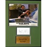 Martin Kemp signature piece, mounted below colour photo from The Krays. Approx. overall size of