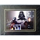 Dave Prowse signed colour Darth Vadar photo. Mounted to approx. size 16x12. Good condition. All