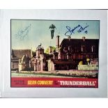 Claudine Auger, Luciano Paluzzi and Lois Maxwell signed colour Thunderball photo. Mounted to approx.