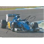 Marcus Ericson signed 12x8 colour photo. Swedish race car driver currently racing for Sauber in