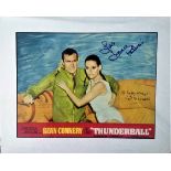 Claudine Auger, Luciana Paluzzi and Lois Maxwell signed colour Thunderball photo. Mounted to approx.