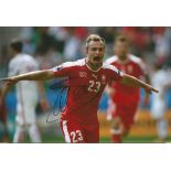 Xherdan Shaqiri Stoke City Signed Switzerland 8x12 Photo. Good condition. All signed items come with