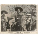 Eli Wallach signed 10x8 b/w photo from The Magnificent Seven. Few creases and knocks to edges but