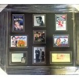 Danny Kaye signature piece and Sylvia Kaye signed cheque. Mounted and framed with various photos and