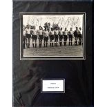 1954 World Cup Uruguay signed photo. 10 x 8 b/w photo signed by the squad mounted to an overall size