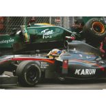 Karun Chandhok signed 12x8 colour photo. Indian racing driver who last competed in Formula E for