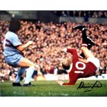 Denis Law 10x8 coloured signed photo scoring against West Ham in the early seventies. Dennis Law