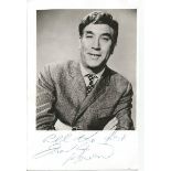 Frankie Howerd signed small black and white photo. English comedian and comic actor whose career,