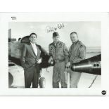 Robert White US test pilot signed 10 x 8 b/w photo standing in relaxed pose with a very young Neil