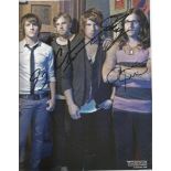 Kings of Leon signed 10x8 colour magazine page. Signed by 4. American rock band that formed in