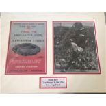 Denis Law signed b/w photo. Mounted alongside matchday programme front cover of Challenge Cup