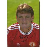 Steve Bruce Signed Manchester United 8x12 Photo. Good Condition. All signed items come with our