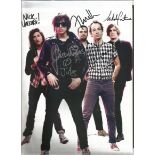 The Strokes signed A4 colour magazine page. American rock band from New York City. Formed in 1998.