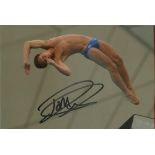 Tom Daley signed 6x4 colour action photo. specialises in the 10-metre platform event and is a double