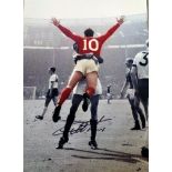 Geoff Hurst signed 16x12 colourised 1966 World Cup photo. former England international footballer. A