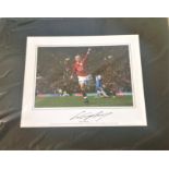 Wayne Rooney signed colour photo, celebrating his 50th premiership goal. Mounted to approx.