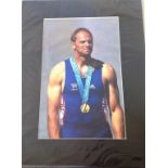 Sir Steve Redgrave signed colour photo with Sydney 2000 gold medal. Mounted to approx. overall