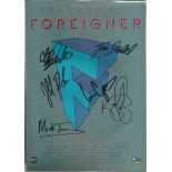 Foreigner signed A4 colour magazine page. Signed by 6. English-American rock band, originally formed