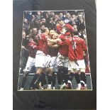 Wayne Rooney, Michael Carrick and Rio Ferdinand signed colour Manchester Utd celebration photo.