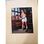 Henry Cooper signed colour photo. Mounted to approx. overall size 16x12 (3 May 1934 - 1 May 2011)