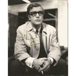 Michael Caine signed 10x8 b/w photo. English actor, producer and author. Known for his distinctive