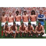 Football signed 12 x 8 photo ARNOLD MUHREN of HOLLAND, col the Netherlands team posing for a team