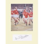 Jack Charlton. Signature mounted with 10x8 picture with World Cup. Professionally mounted to