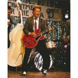 Michael J Fox signed 10 x 8 Back to the Future Guitar scene colour photo. Canadian American actor,