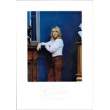 J K Rowling signature piece mounted below colour portrait photo of the author. Author of the Harry