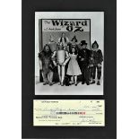 Jack Haley signed cheque mounted below b/w photo from Wizard of Oz. Approx. overall size 15x11.