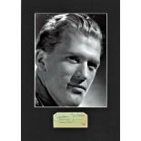 Gordon Jackson signature piece mounted below b/w photo. Approx. overall size 15x12. Scottish actor