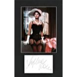 Sophia Loren large signature piece mounted below colour photo. Approx. overall size 17x10. Italian
