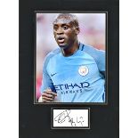 Ya ya Toure signature piece below colour Manchester City photo. Mounted to approx. size 16x12.